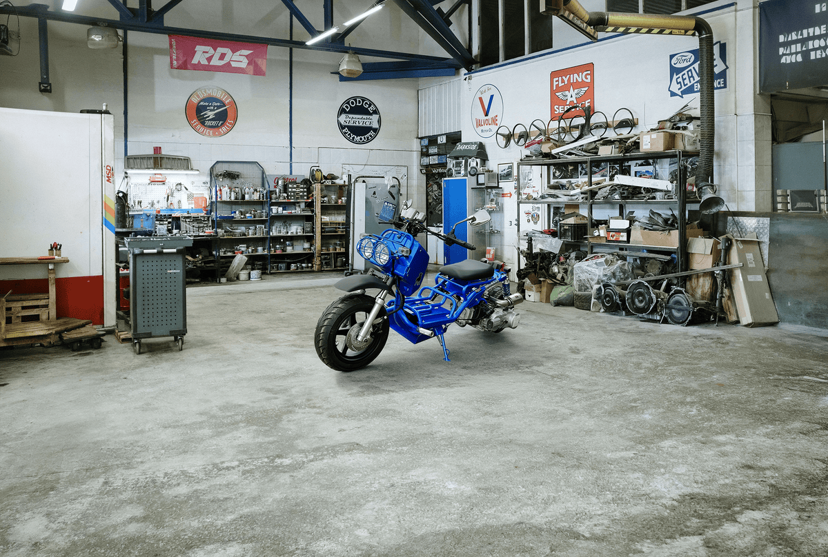 IceBear Maddog Gen I 50cc Scooter (PMZ50-19) - Maddog Gen I 50cc in a garage